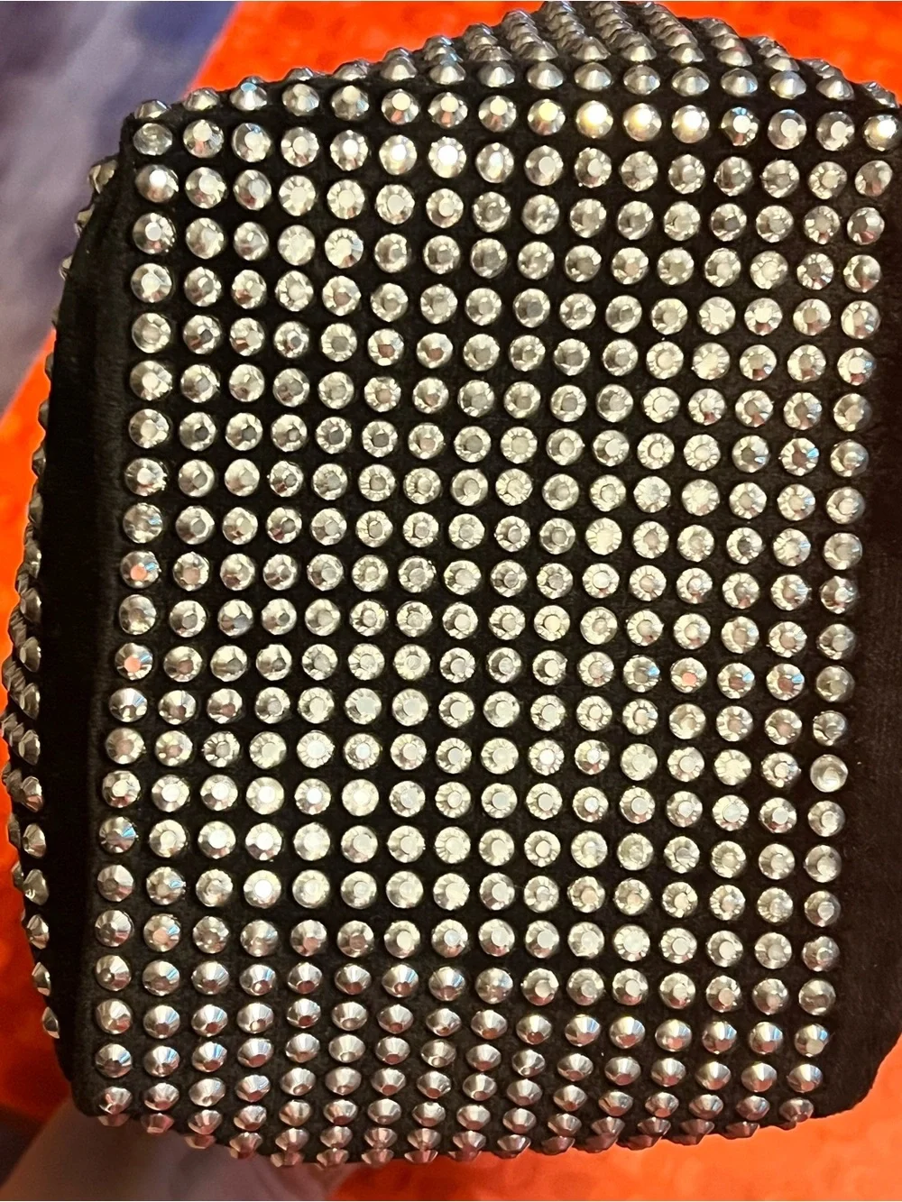 Fun and funky black and silver studded bucket bag. 80s and 90s studio 51 vibes!